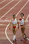 A joyful moment after Jo Pavey finishes 3rd with Helen Clitheroe (both England) womens 5000 metres at the Commonwealth Games, Glasgow. Photo: David T. Hewitson/Sports for All Pics